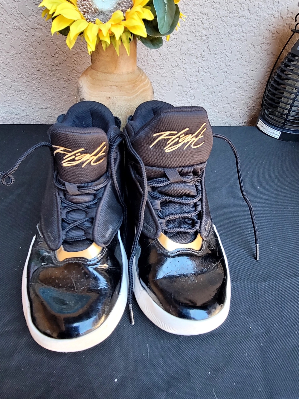 Jordan Kids Black and Gold High-Top Sneakers
